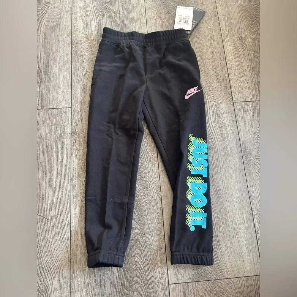 Nike Kids Black Joggers with Pink Logo and Blue Text